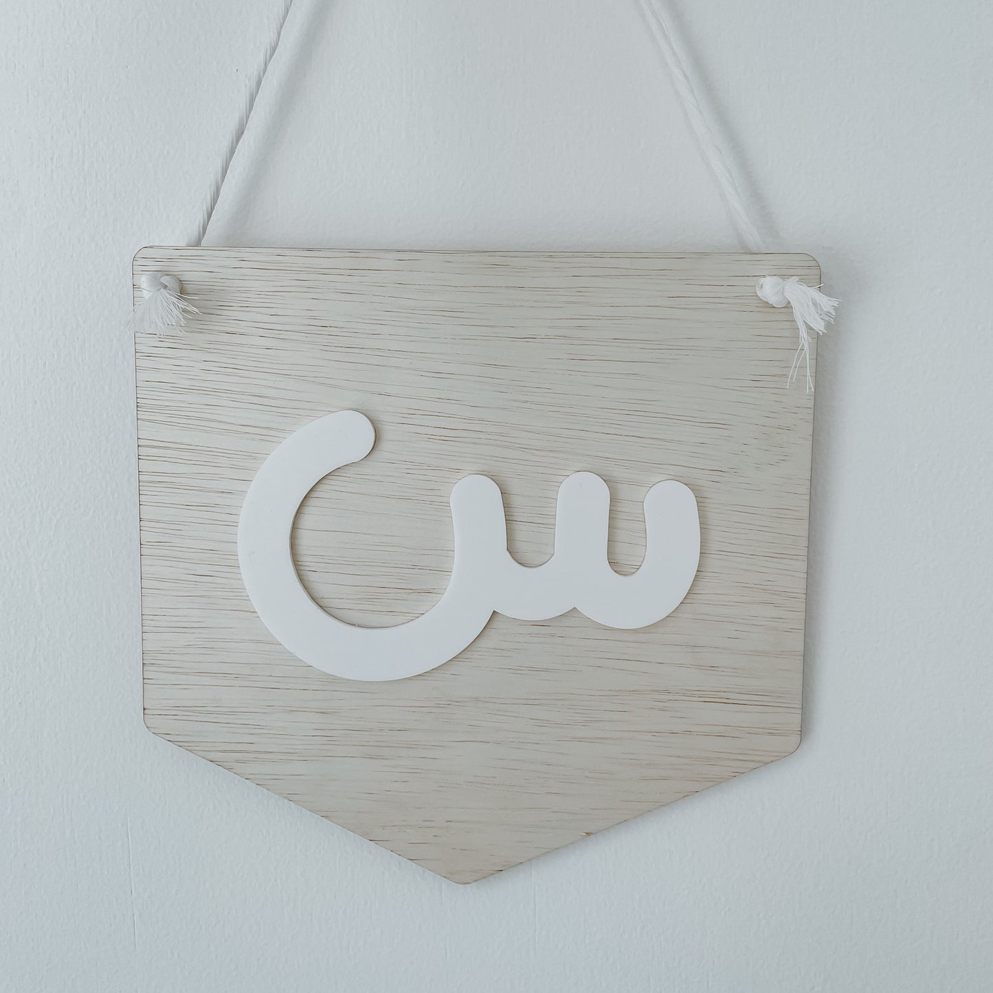 Initial hanging sign