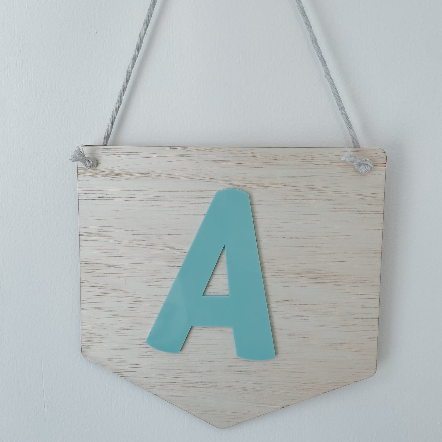 Initial hanging sign